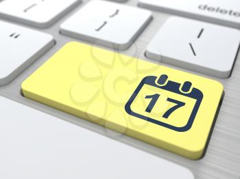 Desktop Calendar Icon on Yellow Computer Button.