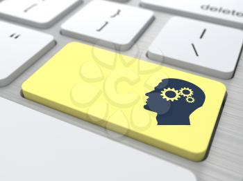 Profile of Head with a Gears on the Yellow Computer Button.