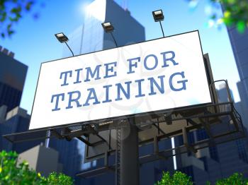Business Education Concept. SloganTime for Training on Billboard on the Background of a Modern Business Center.