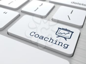 Business Concept. Coaching Button on Modern Computer Keyboard.