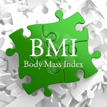 BMI- Body Mass Index - Written on Green Puzzle Pieces. Health Concept.
