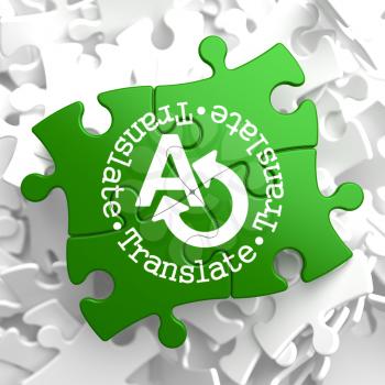 Translate on Green Puzzle Pieces. Communication Concept.