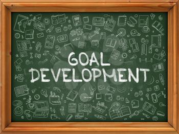 Goal Development - Hand Drawn on Green Chalkboard. Goal Development with Doodle Icons Around.