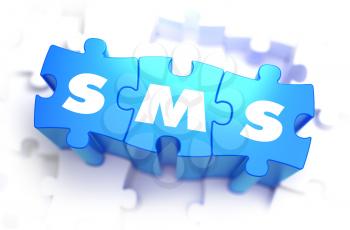SMS - Text on Blue Puzzles on White Background. 3D Render. 