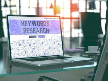 Keywords Research - Closeup Landing Page in Doodle Design Style on Laptop Screen. On Background of Comfortable Working Place in Modern Office. Toned, Blurred Image. 3D Render.