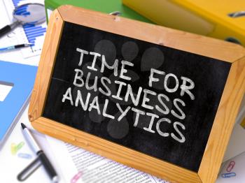 Time for Business Analytics Concept Hand Drawn on Chalkboard on Working Table Background. Blurred Background. Toned Image. 3D Render.