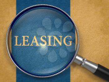 Leasing through Magnifying Glass on Old Paper with Dark Blue Vertical Line Background. 3D Render.