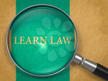 Learn Law Concept through Magnifier on Old Paper with Blue Vertical Line Background. 3D Render.