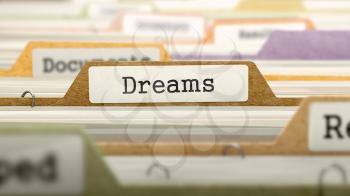 File Folder Labeled as Dreams in Multicolor Archive. Closeup View. Blurred Image. 3D Render.