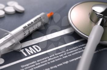 TMD - Printed Diagnosis on Grey Background with Blurred Text and Composition of Pills, Syringe and Stethoscope. Medical Concept. Selective Focus. 3D Render. 