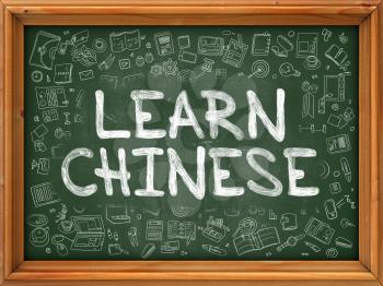 Learn Chinese Concept. Line Style Illustration. Learn Chinese Handwritten on Green Chalkboard with Doodle Icons Around. Doodle Design Style of  Learn Chinese.