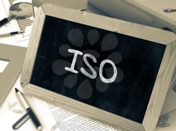 ISO - International Organization Standardization - Handwritten on Chalkboard. Blurred, Toned Image. 3D Render.