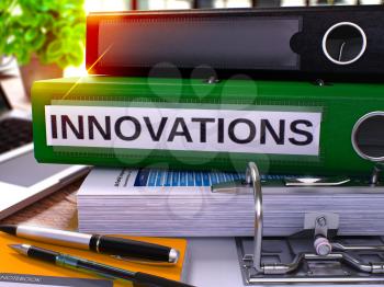 Innovations - Green Office Folder on Background of Working Table with Stationery and Laptop. Innovations Business Concept on Blurred Background. Innovations Toned Image. 3D Render.