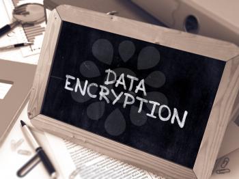 Handwritten Data Encryption on a Chalkboard. Composition with Chalkboard and Ring Binders, Office Supplies, Reports on Blurred Background. Toned Image. 3D Render.