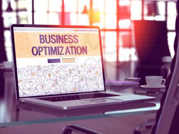 Business Optimization - Closeup Landing Page in Doodle Design Style on Laptop Screen. On Background of Comfortable Working Place in Modern Office. Toned, Blurred Image. 3D Render.