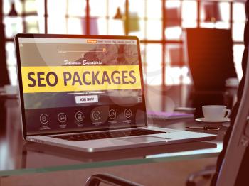 SEO - Search Engine Optimization - Packages Concept. Closeup Landing Page on Laptop Screen  on background of Comfortable Working Place in Modern Office. Blurred, Toned Image. 3D Render.