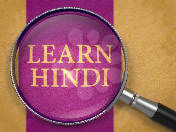 Learn Hindi through Loupe on Old Paper with Dark Lilac Vertical Line Background. 3D Render.