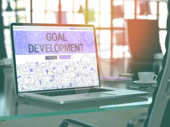 Goal Development Concept. Closeup Landing Page on Laptop Screen in Doodle Design Style. On Background of Comfortable Working Place in Modern Office. Blurred, Toned Image. 3D Render.