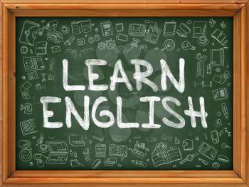 Learn English Concept. Line Style Illustration. Learn English Handwritten on Green Chalkboard with Doodle Icons Around. Doodle Design Style of  Learn English.