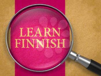 Learn Finnish Concept through Magnifier on Old Paper with Lilac Vertical Line Background. 3D Render.