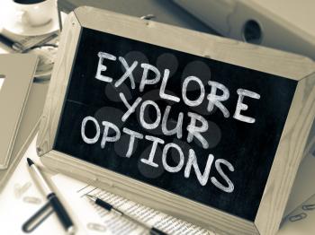 Explore Your Options Concept Hand Drawn on Chalkboard on Working Table Background. Blurred Background. Toned Image. 3D Render.