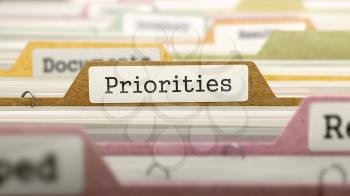 Priorities Concept. Colored Document Folders Sorted for Catalog. Closeup View. Selective Focus. 3D Render.