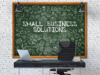 Small Business Solutions Concept Handwritten on Green Chalkboard with Doodle Icons. Office Interior with Modern Workplace. White Brick Wall Background. 3D.