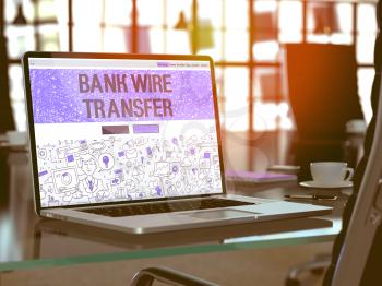 Bank Wire Transfer - Closeup Landing Page in Doodle Design Style on Laptop Screen. On Background of Comfortable Working Place in Modern Office. Toned, Blurred Image. 3D Render. 