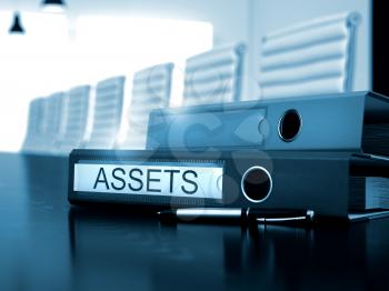 Assets - Business Illustration. Assets - Office Binder on Black Desktop. Assets. Business Concept on Toned Background. 3D Render.