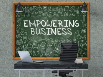 Empowering Business - Handwritten Inscription by Chalk on Green Chalkboard with Doodle Icons Around. Business Concept in the Interior of a Modern Office on the Gray Concrete Wall Background. 3D.