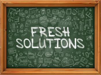 Fresh Solutions - Hand Drawn on Chalkboard. Fresh Solutions with Doodle Icons Around.