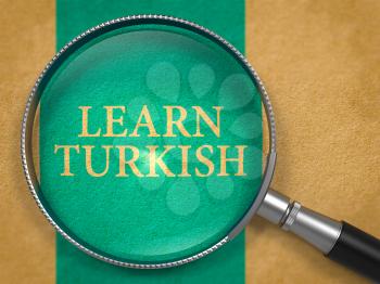 Learn Turkish through Loupe on Old Paper with Blue Vertical Line Background. 3D Render.