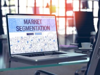 Market Segmentation Concept. Closeup Landing Page on Laptop Screen in Doodle Design Style. On Background of Comfortable Working Place in Modern Office. Blurred, Toned Image. 3D Render.