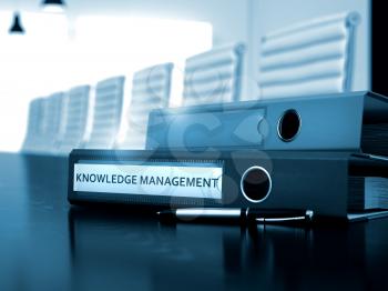 Knowledge Management. Illustration on Toned Background. Knowledge Management - Illustration. Ring Binder with Inscription Knowledge Management on Wooden Desktop. 3D.