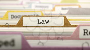 Law Concept on Folder Register in Multicolor Card Index. Closeup View. Selective Focus. 3D Render.