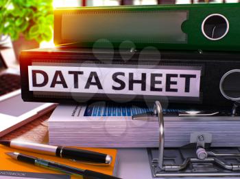 Data Sheet - Black Office Folder on Background of Working Table with Stationery and Laptop. Data Sheet Business Concept on Blurred Background. Data Sheet Toned Image. 3D.