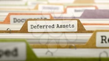 Deferred Assets Concept. Colored Document Folders Sorted for Catalog. Closeup View. Selective Focus. 3D Render.