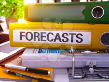 Forecasts - Yellow Office Folder on Background of Working Table with Stationery and Laptop. Forecasts Business Concept on Blurred Background. Forecasts Toned Image. 3D.