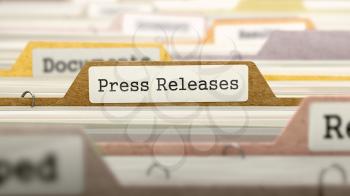 Press Releases on Business Folder in Multicolor Card Index. Closeup View. Blurred Image. 3D Render.