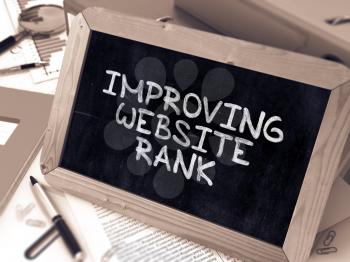 Improving Website Rank - Chalkboard with Hand Drawn Text, Stack of Office Folders, Stationery, Reports on Blurred Background. Toned Image. 3D Render.
