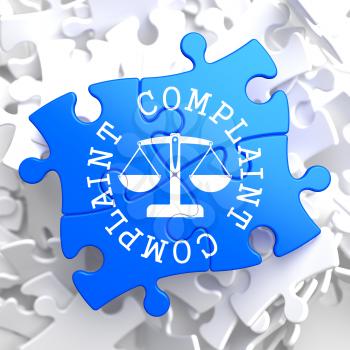 Complaint Word Written Arround Icon of Scales in Balance, Located on Blue Puzzle. Business Concept.