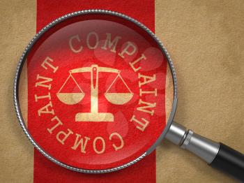 Magnifying Glass with Complaint Word Written Arround Icon of Scales in Balance on Old Paper with Red Vertical Line Background.