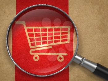 Magnifying Glass with Shopping Cart Icon on Old Paper with Red Vertical Line Background. Business Concept.