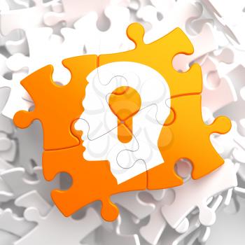 Psychological Concept - Profile of Head with a Keyhole Located on Orange Puzzle.