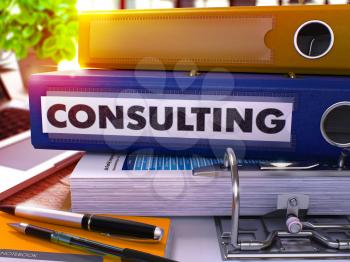 Consulting - Blue Ring Binder on Office Desktop with Office Supplies and Modern Laptop. Consulting Business Concept on Blurred Background. Consulting - Toned Illustration. 3D Render.