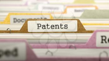 File Folder Labeled as Patents in Multicolor Archive. Closeup View. Blurred Image. 3D Render.
