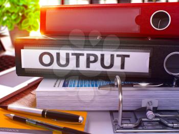 Output - Black Office Folder on Background of Working Table with Stationery and Laptop. Output Business Concept on Blurred Background. Output Toned Image. 3D.