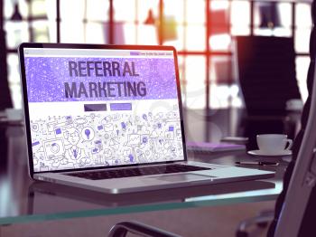 Referral Marketing - Closeup Landing Page in Doodle Design Style on Laptop Screen. On Background of Comfortable Working Place in Modern Office. Toned, Blurred Image. 3D Render.