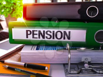 Pension - Green Office Folder on Background of Working Table with Stationery and Laptop. Pension Business Concept on Blurred Background. Pension Toned Image. 3D.