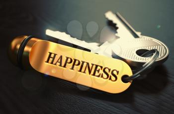 Happiness - Concept on Golden Keychain over Black Wooden Background. Closeup View, Selective Focus, 3D Render. Toned Image.